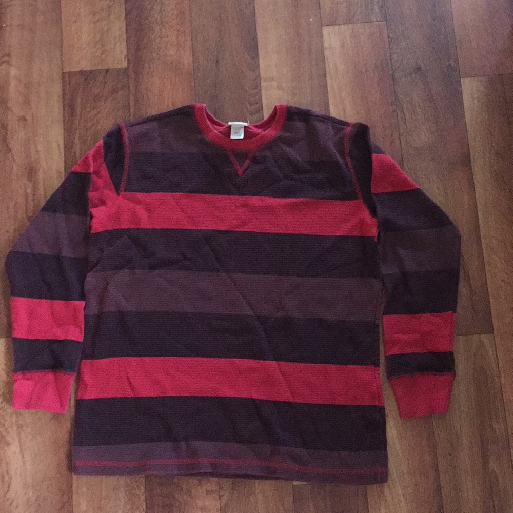 Red striped long sleeve shirt.